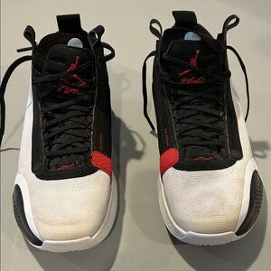 Men’s Jordan XXXIV Black and Red Sneakers